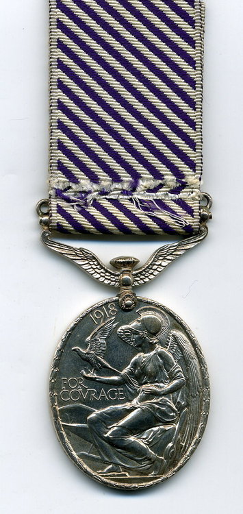 The D.F.M. - Distinguished Flying Medal - Reverse -Squadron Leader Sydney, Horace Fox.jpg