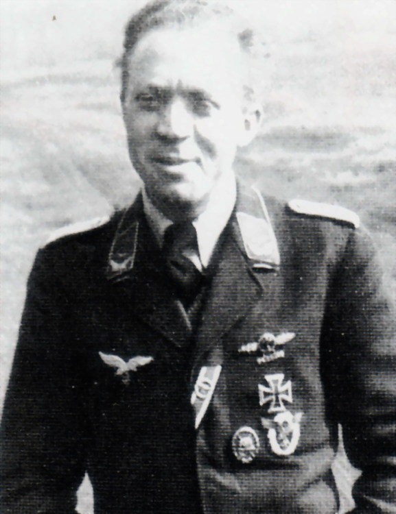 The Pilot wears the Roll of Honour Clasp, Flying Clasp with numbered Pendant, Iron Cross 1st Class,.jpg