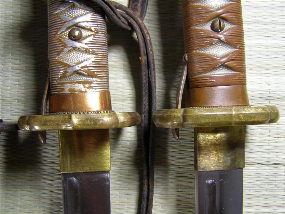 Type 95 Brass Tsuba - Late and Early Variations.JPG