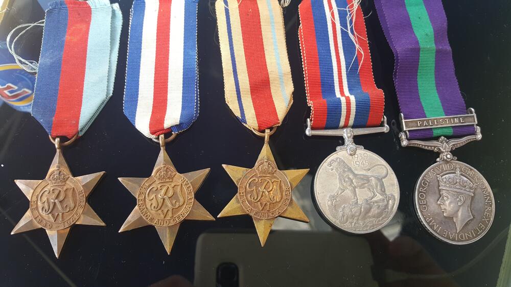 1699619784_Spaldingmedals.thumb.jpg.ec6926cd2c983788b8d79efd447f033a.jpg